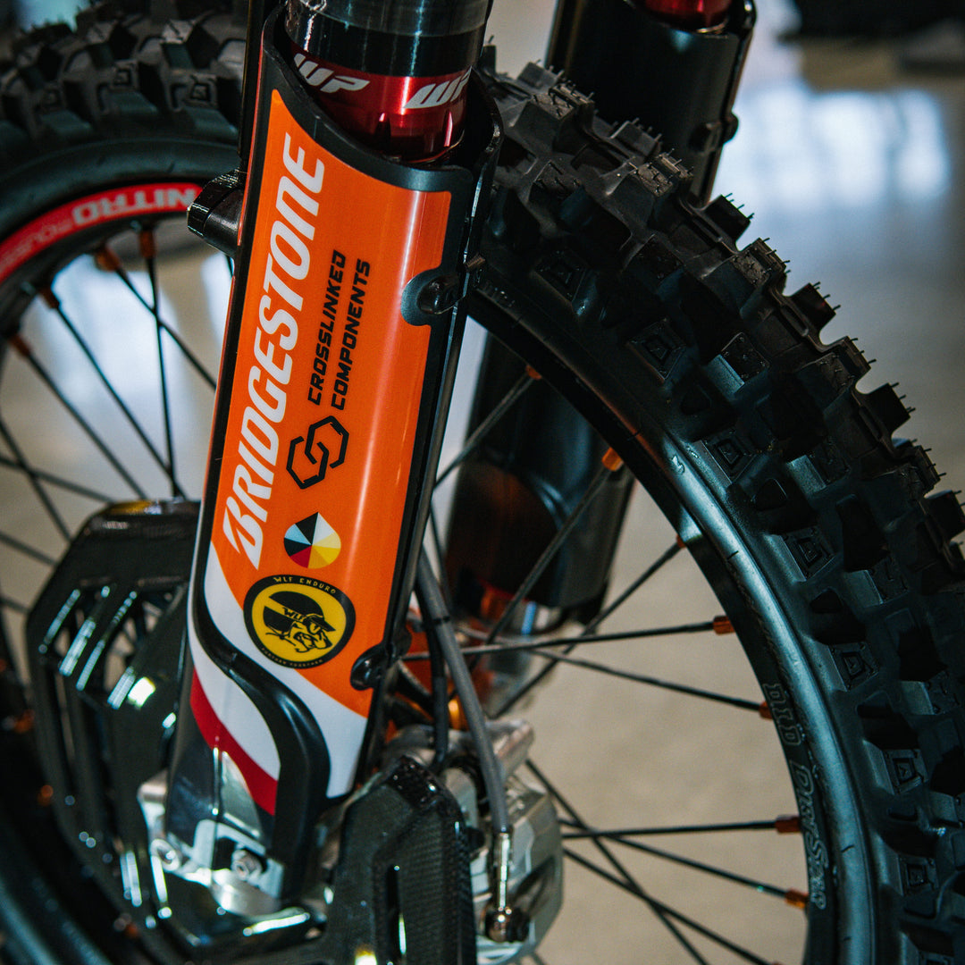 Full Wrap Fork Guards on KTM enduro — cable grip area detail